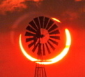 Annular solar eclipse, the &lsquo;Ring of Fire,&rsquo; behind a windmill